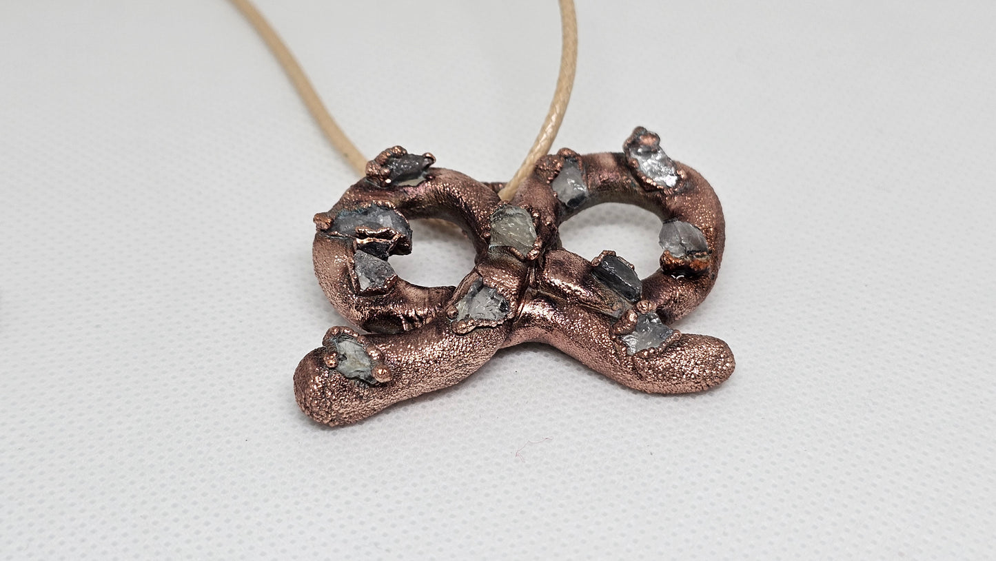 What a twist copper and crystal electroformed pendant