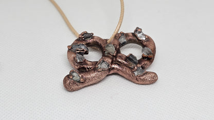 What a twist copper and crystal electroformed pendant