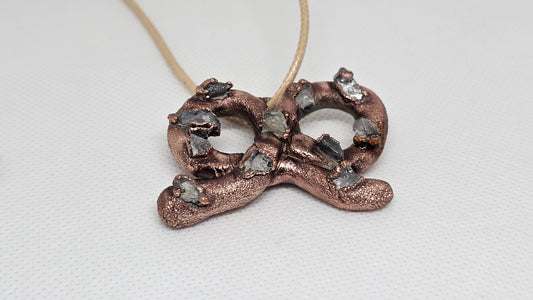 What a twist copper and crystal electroformed pendant