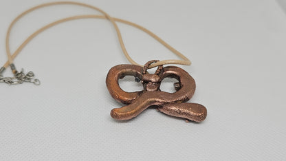 What a twist copper and crystal electroformed pendant
